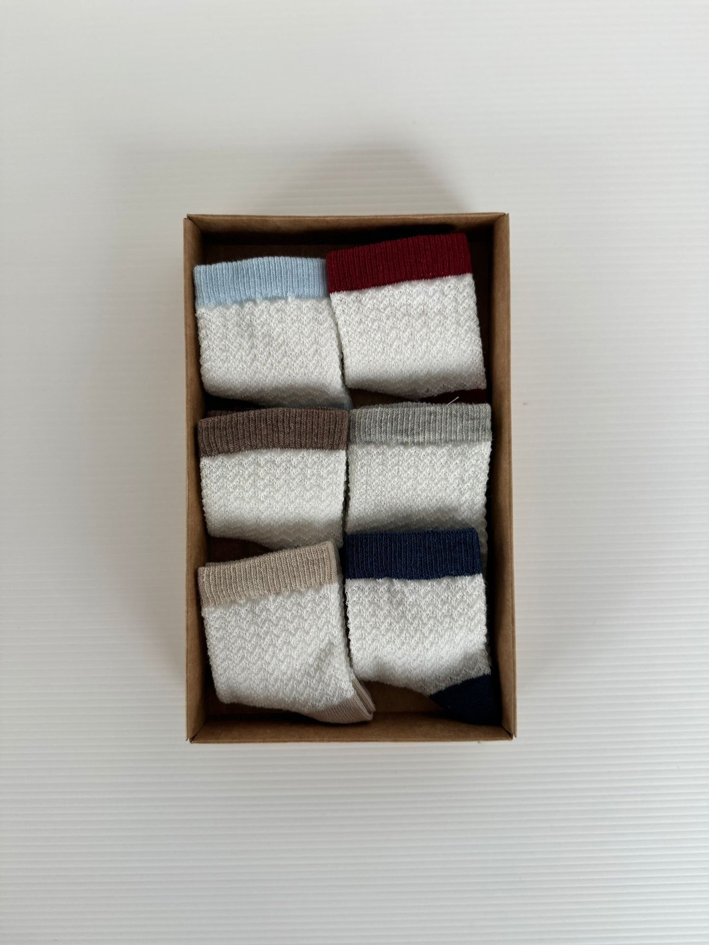 Coffret Naissance Chaussettes Bébé – Confort & Élégance